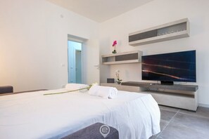 1 habitación, tabla de planchar con plancha, wifi y ropa de cama 