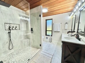 Shower, hair dryer, towels, soap