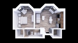 Plano de planta de un apartamento moderno con sala de estar, cocina, baño y un pequeño balcón.
