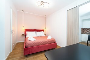 1 dormitorio, tabla de planchar con plancha, cuna de viaje y wifi