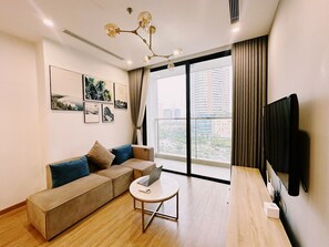 Apartment, 1 Bedroom | Living area | 42-inch TV with cable channels - Sunny - Vinhomes Skylake Residences (Hanoi)