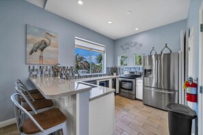Fridge, microwave, oven, stovetop - Beach Beauty: Pet-Friendly Destiny West Home w/Community Pool + Beach Access (Destin)