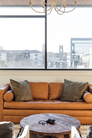 Luxury Condo, Balcony, City View | Living area | 65-inch Smart TV with digital channels, video-game console, DVD player