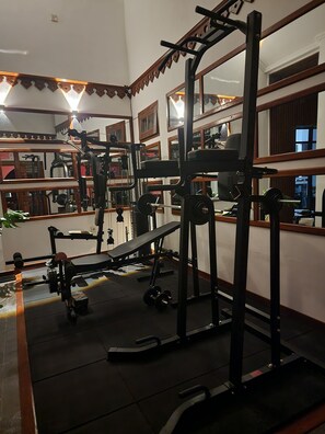 Work out in style with a fully equipped gym featuring exercise machines and free weights.