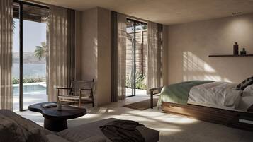 Suite Premium, vue mer | Literie de qualité supérieure, minibar, coffres-forts dans les chambres