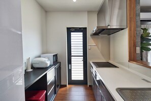 Fridge, microwave, stovetop, cookware/dishes/utensils