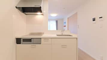 Fridge, microwave, stovetop, cookware/dishes/utensils