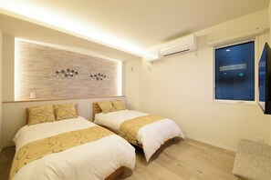 2 dormitorios, escritorio, wifi gratis y ropa de cama