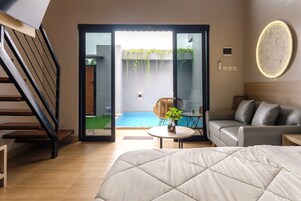 Basic Villa | Living area | 32-inch Smart TV with digital channels