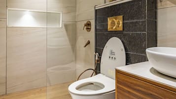 Deluxe Double Room, Courtyard View | Bathroom | Shower, hair dryer, towels, soap