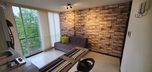 Appartamento, 1 camera da letto, fumatori, vista giardino | Area soggiorno