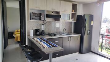 Departamento, 1 habitación, para fumadores, vista al jardín | Interior