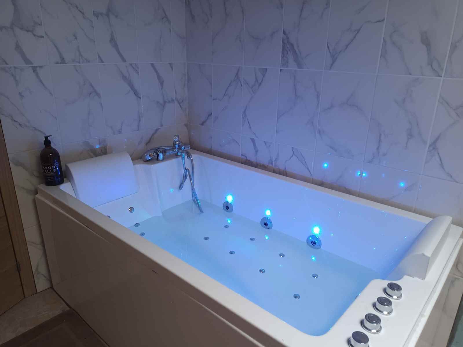 Shower, jetted tub, hair dryer, towels