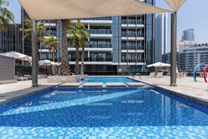 Outdoor pool, open 8:00 AM to 10:00 PM, sun loungers