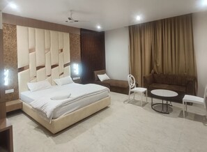 Deluxe Double Room, Balcony, City View | Desk, laptop workspace, free WiFi