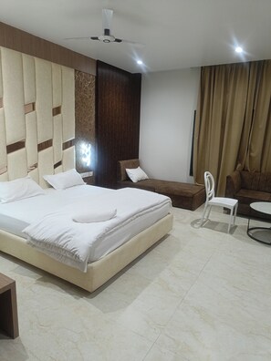 Deluxe Double Room, Balcony, City View | Desk, laptop workspace, free WiFi