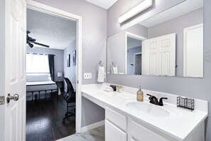 Hair dryer, towels, soap, shampoo