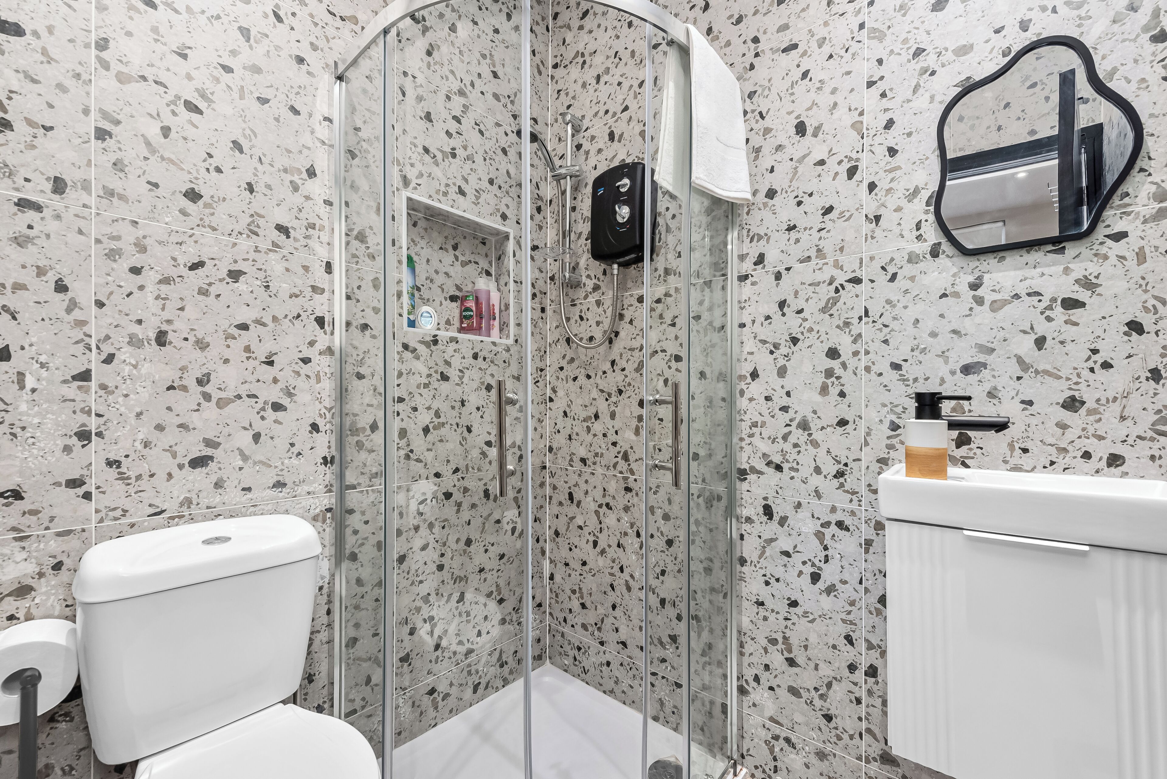 Shower, hair dryer, towels, soap
