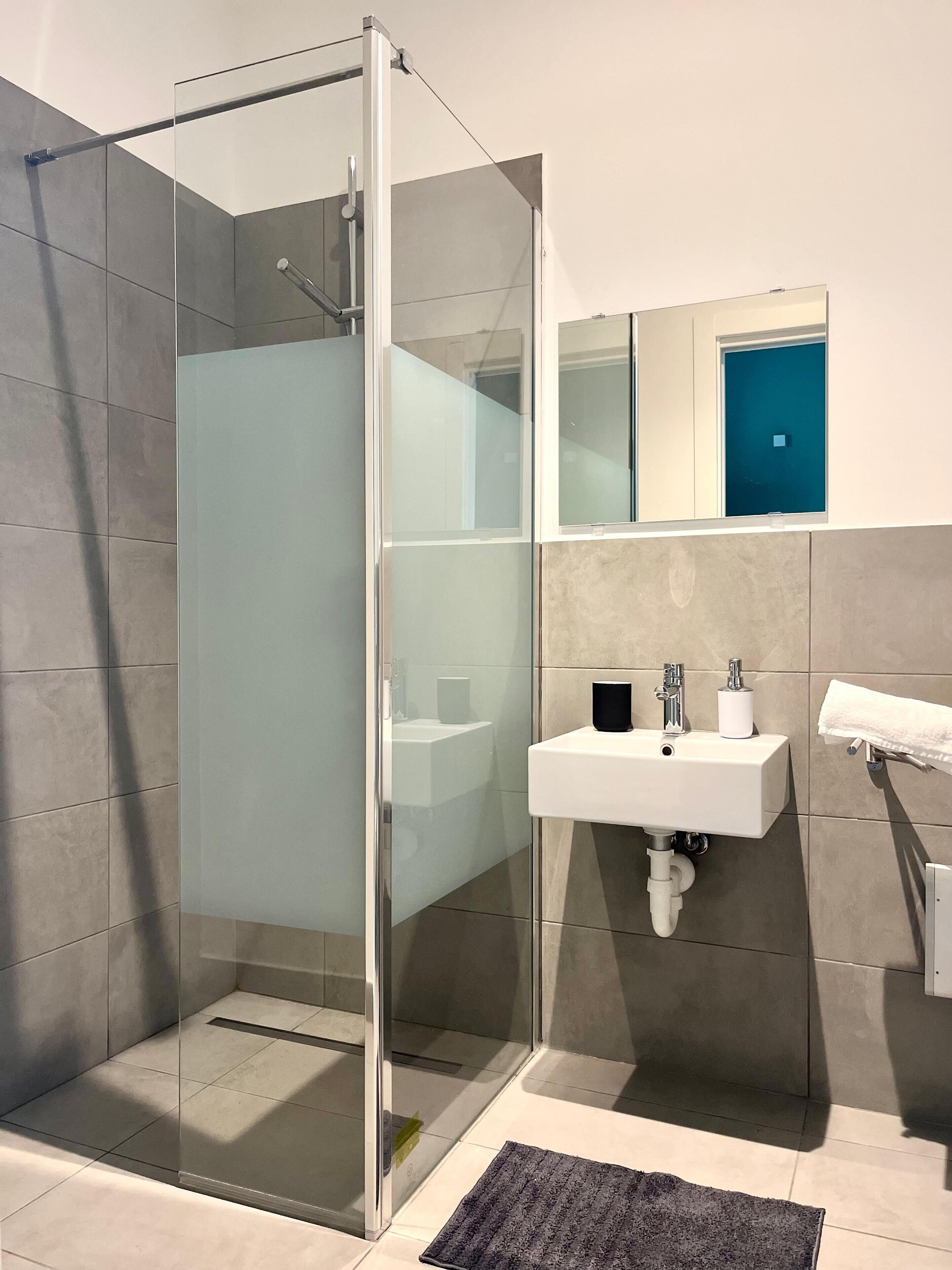 Shower, towels, soap, shampoo