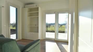 Superior Apartment, Kitchenette, Hill View | Living area | 43-inch Smart TV with cable channels