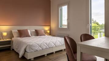 1 dormitorio, sistema de insonorización, tabla de planchar con plancha