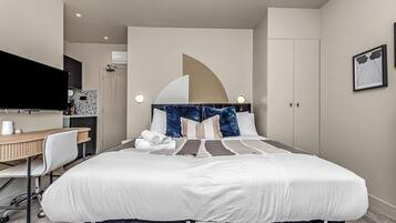 Desk, iron/ironing board, travel crib, WiFi