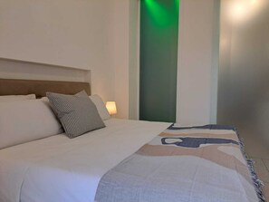 Apartment, 1 Bedroom | 1 bedroom, down comforters, iron/ironing board, free WiFi