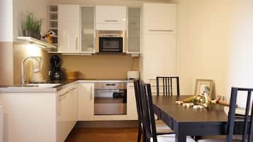 Comfort Apartment, Non Smoking, Balcony | Bathroom | Hair dryer, slippers, towels, soap