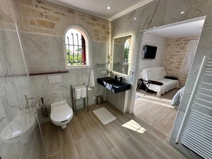 Shower, hair dryer, towels, soap