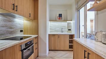 Apartment | Private kitchen | Cleaning supplies