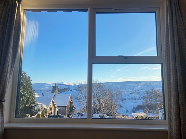 Enjoy a serene view of the surrounding landscape from the comfort of your room.