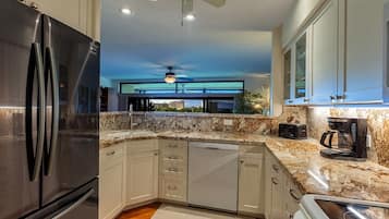 Condo, 2 Bedrooms | Private kitchen | Dishwasher, cookware/dishes/utensils