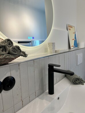 Shower, towels, toilet paper