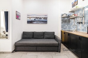 Comfort Quadruple Room | Living area