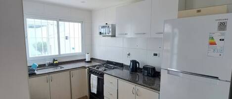 Fridge, microwave, oven, coffee/tea maker