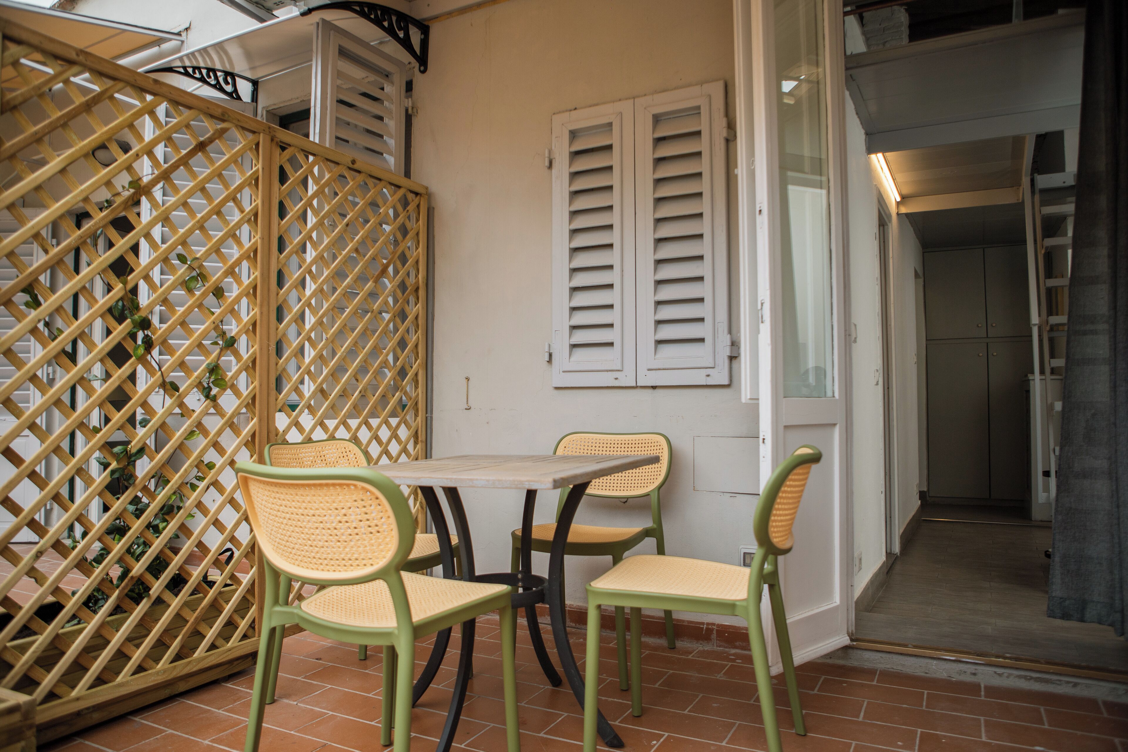 Quarto família, vista para o pátio | Terraço/pátio