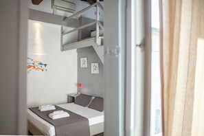 Quadruple Room | Blackout drapes, iron/ironing board, free WiFi