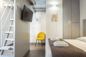 Blackout drapes, iron/ironing board, free WiFi