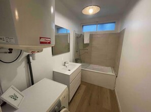 Hair dryer, towels, soap, toilet paper