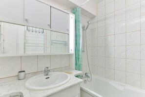 Shower, towels, toilet paper