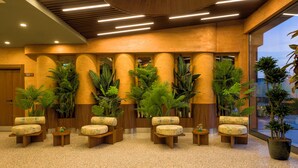 A lobby with a reception desk, seating area, and large windows. - ibis Styles Istanbul Kurtkoy (Istanbul)