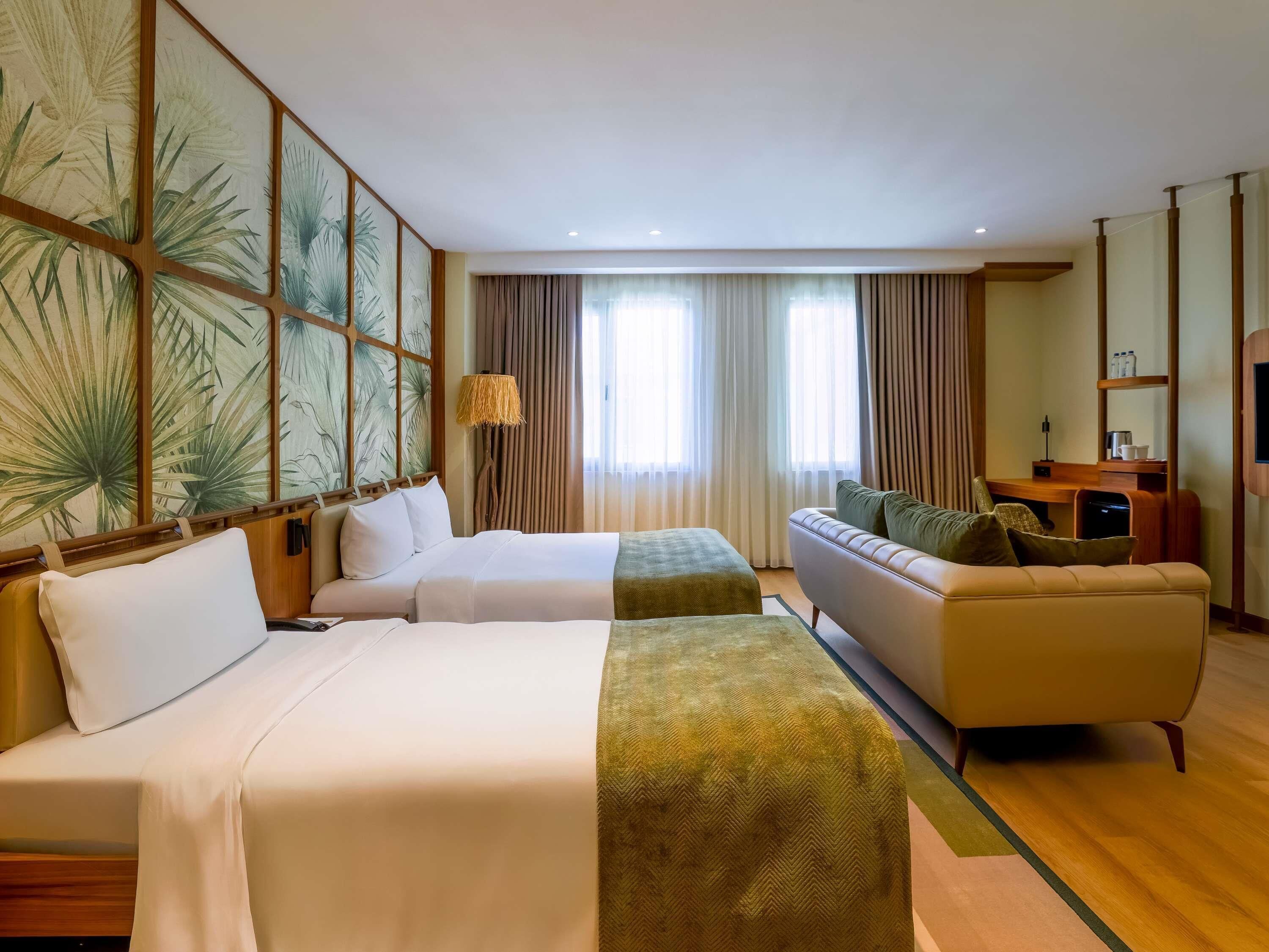 Superior Triple Room, Multiple Beds | In-room safe, desk, blackout drapes, soundproofing