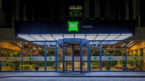 A hotel entrance with a glass door, potted plants, and a sign reading "ibis styles". - ibis Styles Istanbul Kurtkoy (Istanbul)