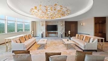 Presidential Suite, 1 King Bed | Living area | 50-inch LED TV with satellite channels