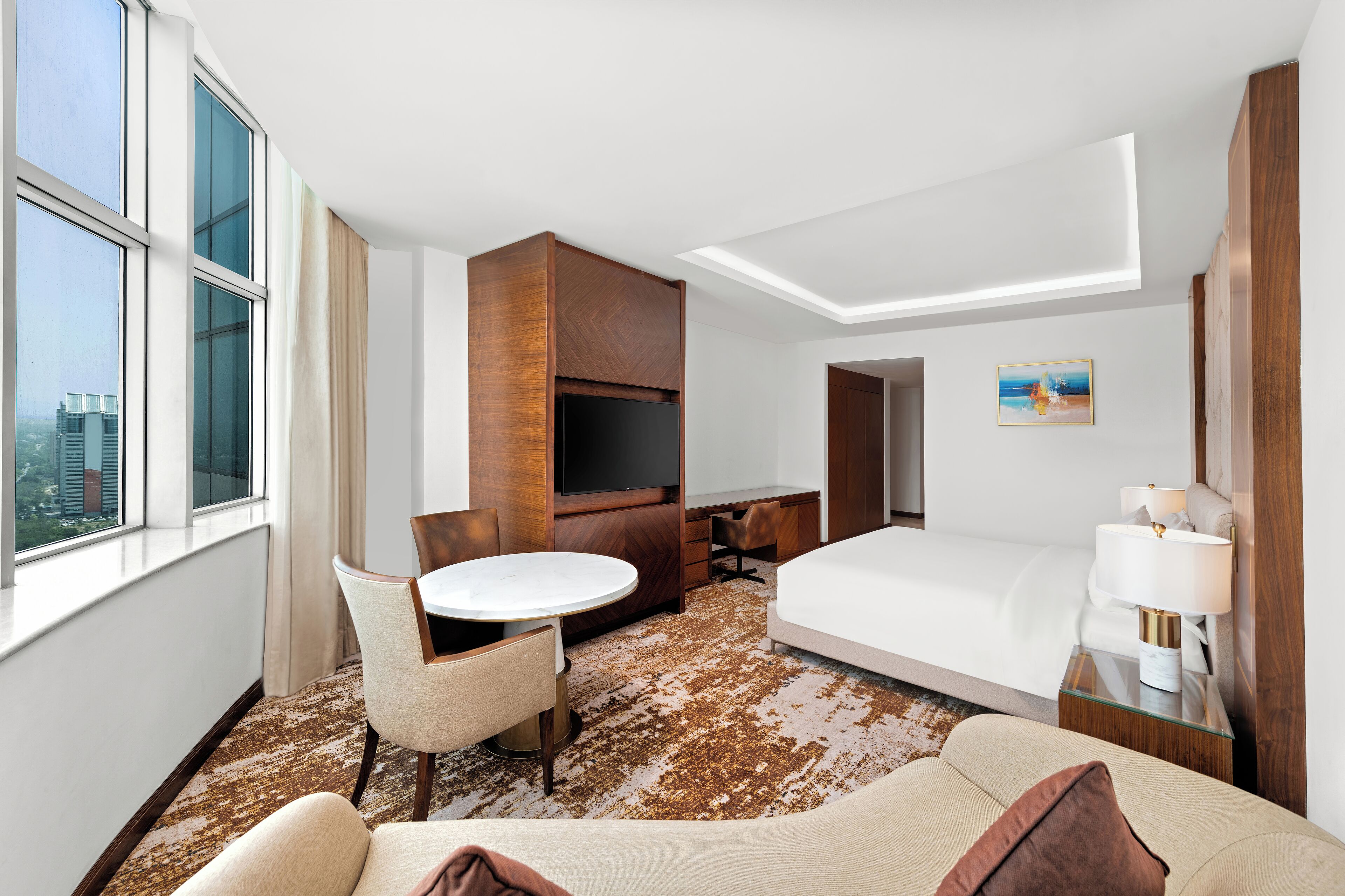 Deluxe kamer, 1 kingsize bed | Luxe beddengoed, donsdekens, een minibar, een kluis op de kamer