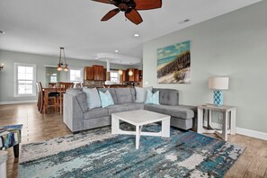 TV, fireplace - Luxurious Escape Steps from the Beach w/ Heated Pool, Dock, & Stunning Views (North Topsail Beach)