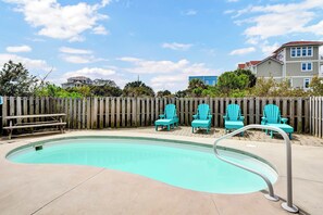 A heated pool - Luxurious Escape Steps from the Beach w/ Heated Pool, Dock, & Stunning Views (North Topsail Beach)