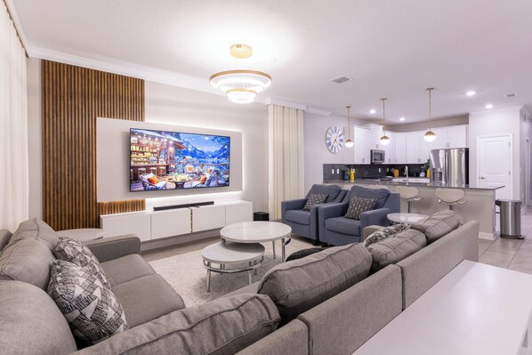 Living area - Modern Resort Home w/ Game Room and Theater, FREE Water Park! (Davenport)