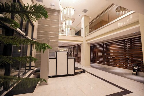 Tripod by Pedestal Hotel