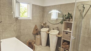 Shower, hair dryer, towels, soap